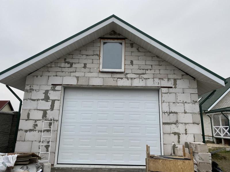 Установка секционных ворот цвет RAL9016 Белый