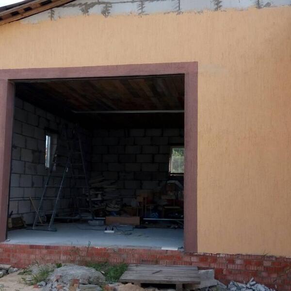 Установка секционных ворот цвет RAL8014 Коричневый