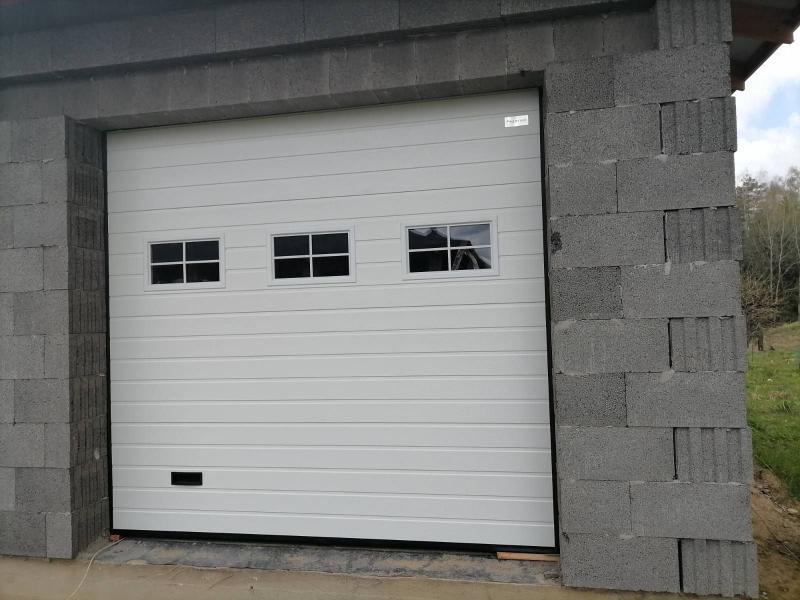 Установка секционных ворот цвет RAL9016 Белый